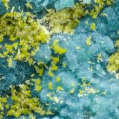 Unknown yellow crystals on chrysocolla from Blue Bell Mine, San Bernadino Co., CA
FOV: 1.22 mm