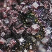 Fluorapatite crystals and iridescent goethite from the Phosphate Stope of Silver Coin Mine, Humboldt Co., NV
FOV: 1.42 mm